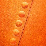 rivets on a rusting train